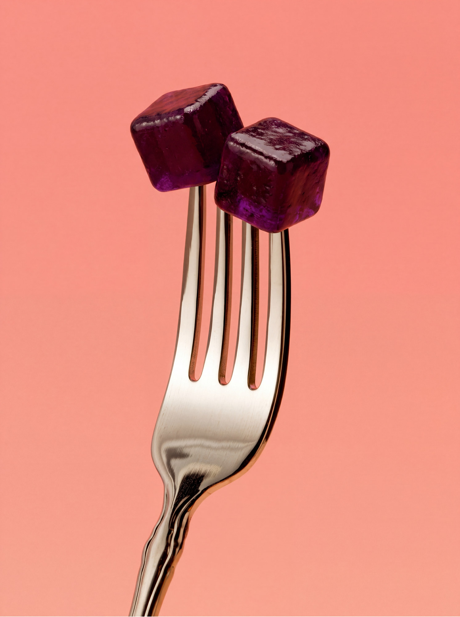 Instant Debloat Gummies on a fork